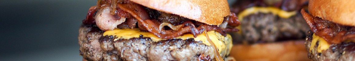 Eating Burger at Blake's Lotaburger restaurant in Las Vegas, NM.